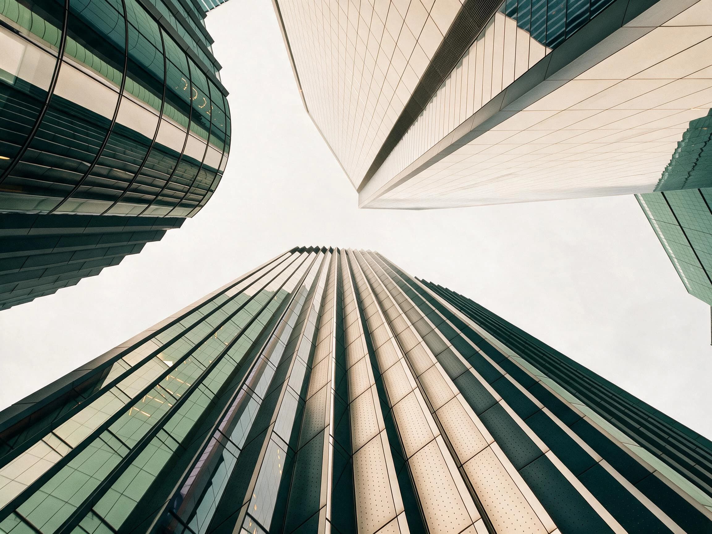 TAJ Holding Group Global Portfolio Hero Building